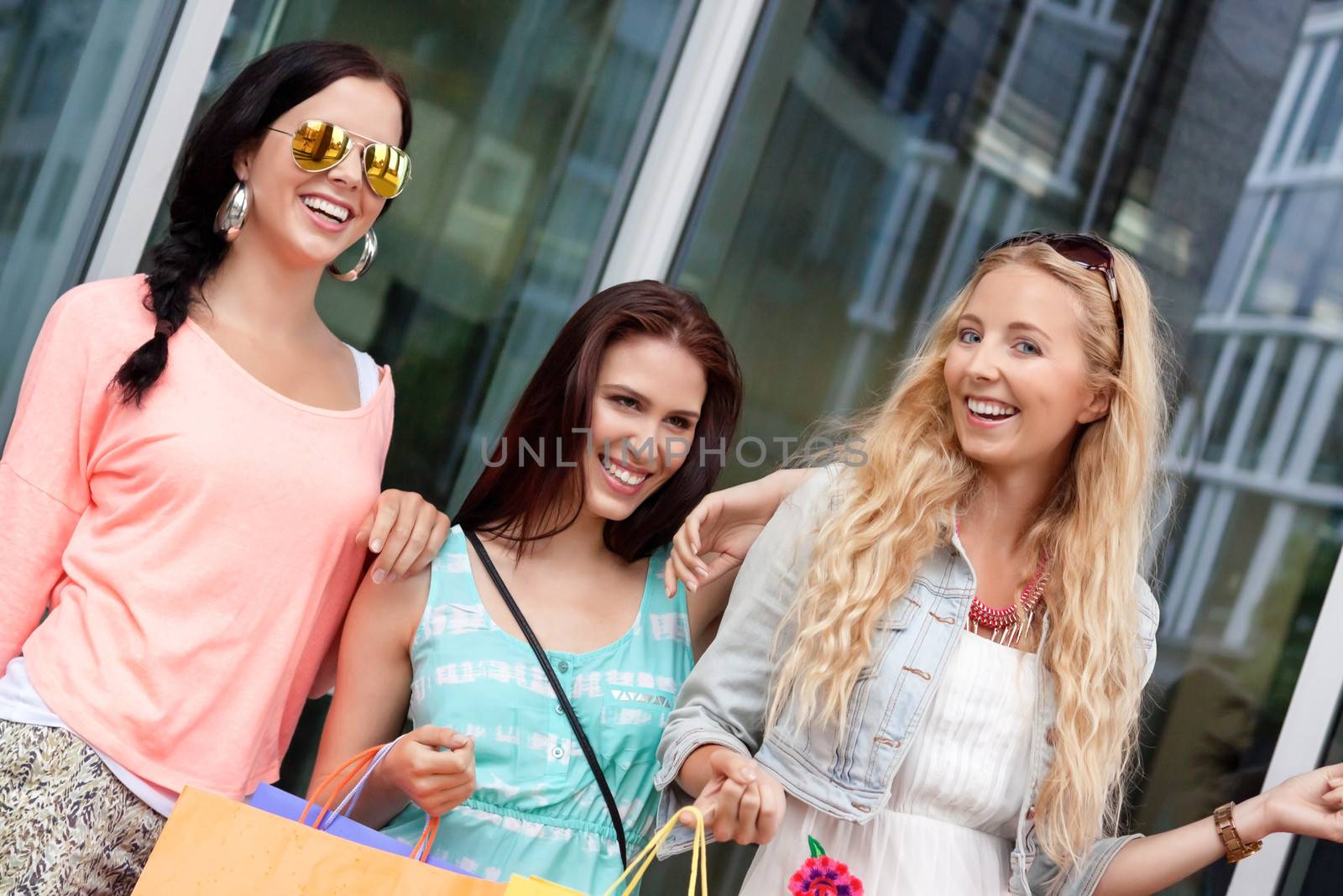 two attractive young girls women on shopping tour outdoor city summer 