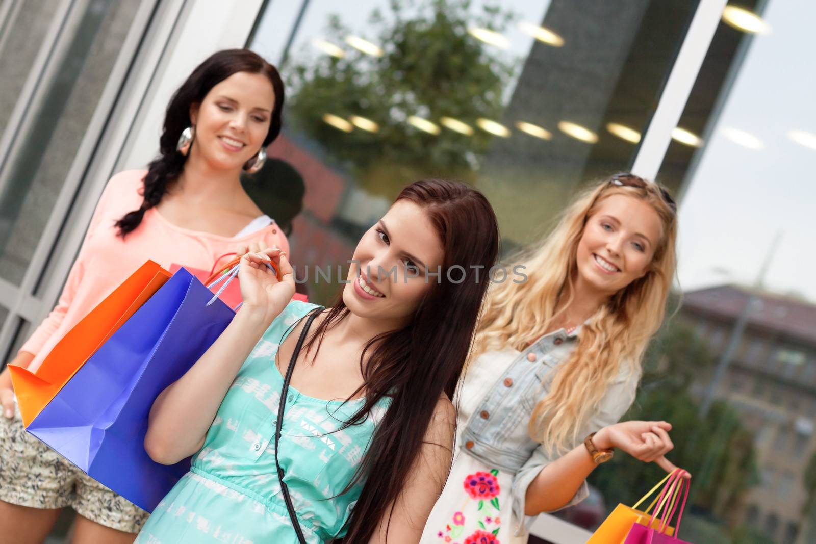 two attractive young girls women on shopping tour by juniart