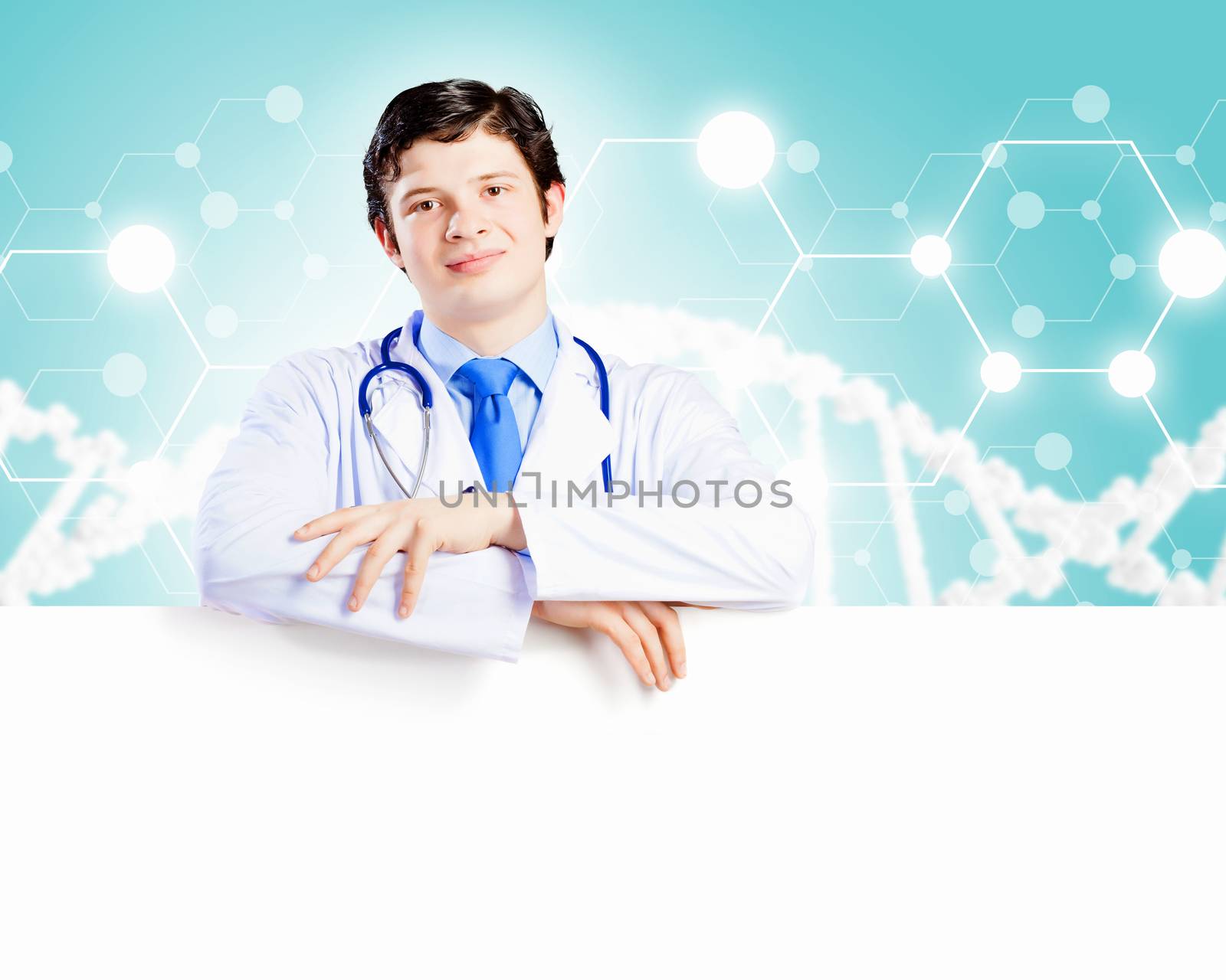 Image of handsome doctor holding white blank banner