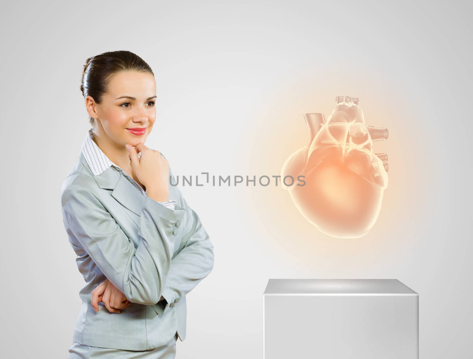 Image of businesswoman looking at icon. Health care