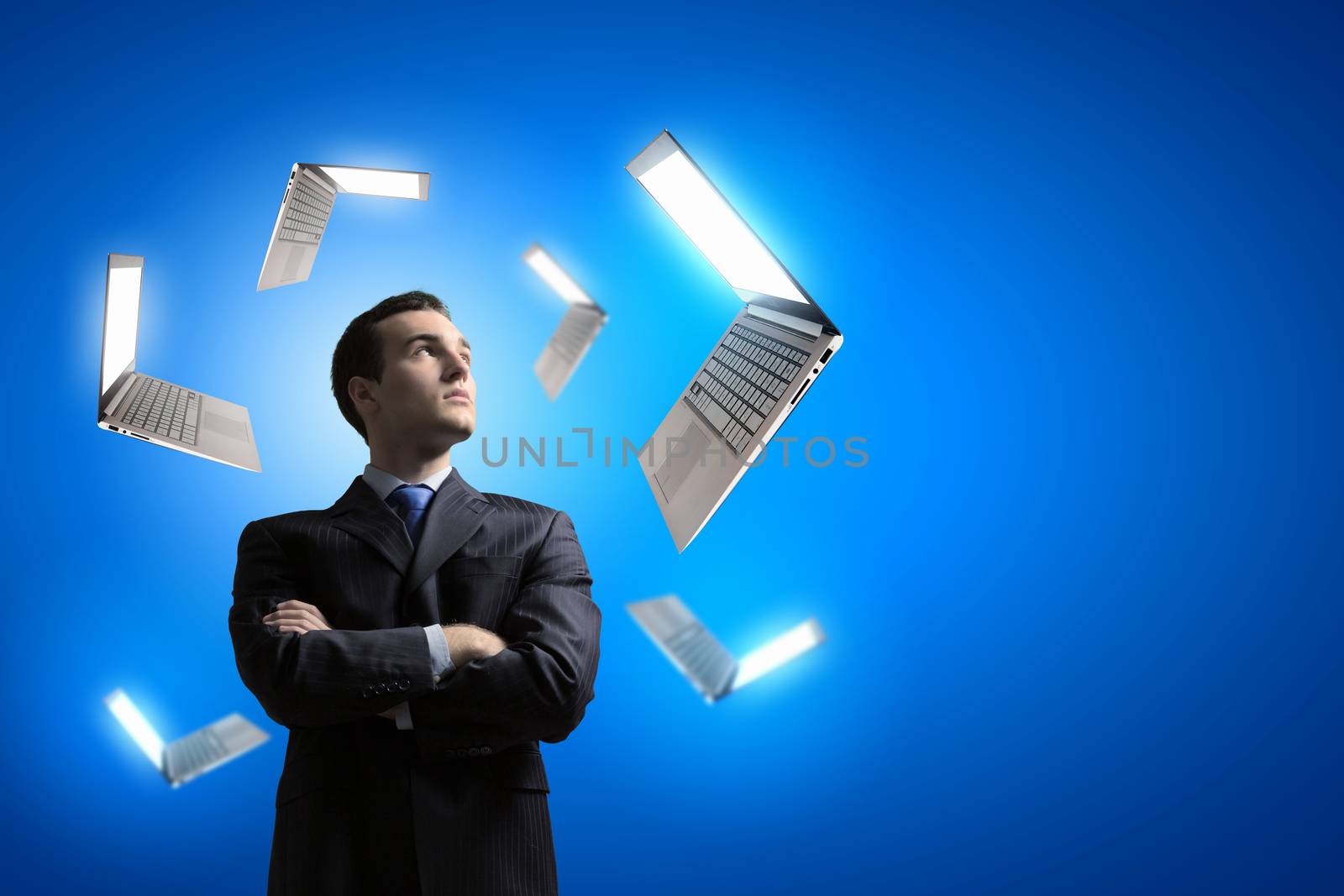 Image of confident businessman with arms crossed on chest