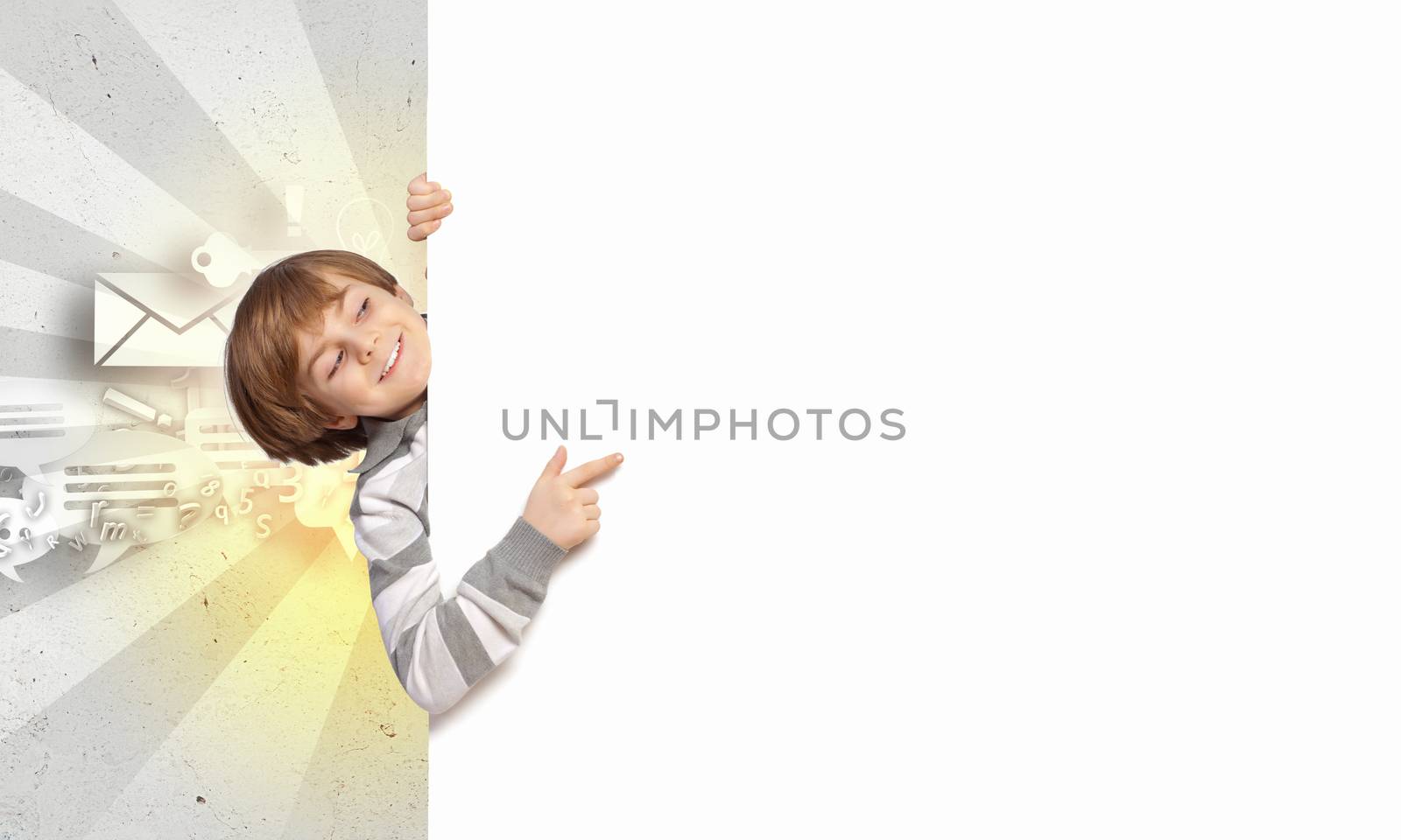 Little boy holding a blank white billboard