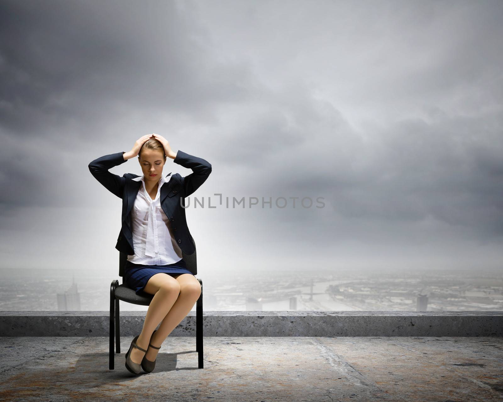 Image of depressed businesswoman sitting on chair