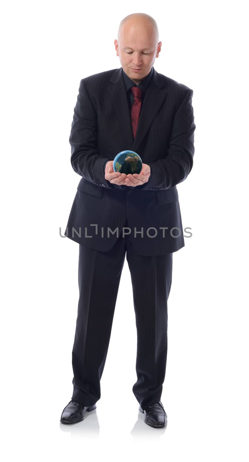 man in a suit holding the planet earth isolated on white background