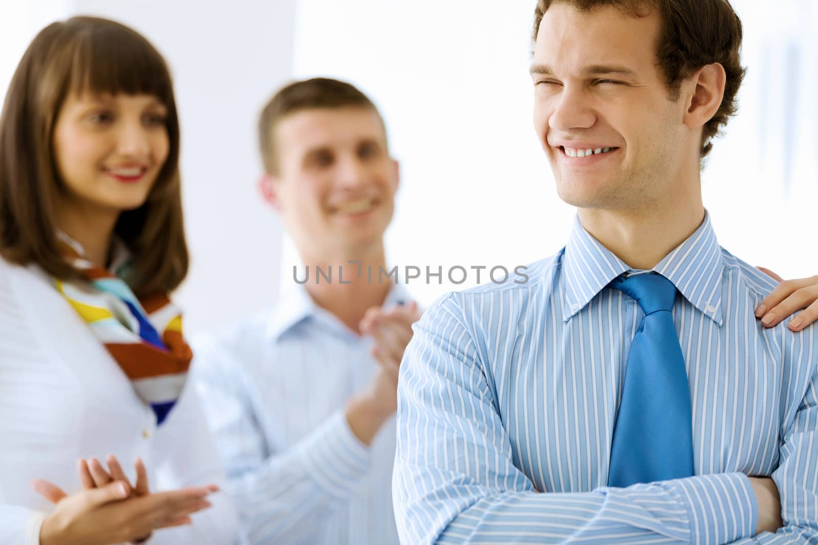 Image of successful young happy business persons