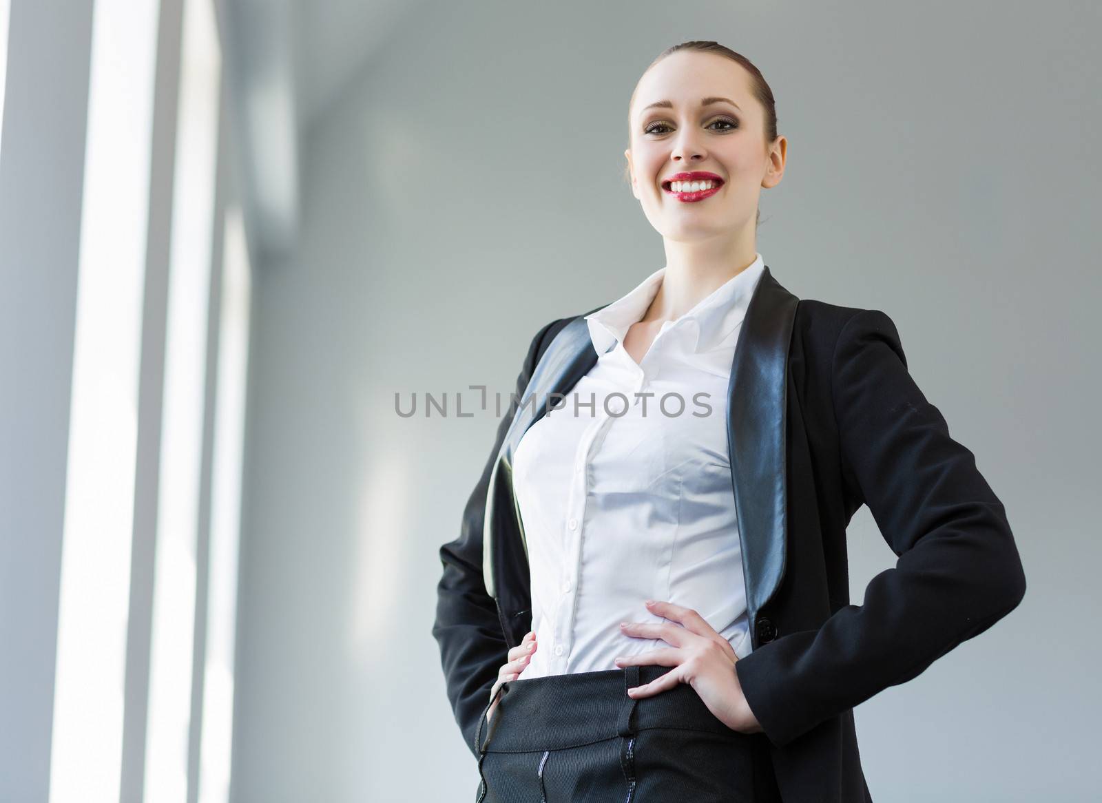 Confident businesswoman by sergey_nivens