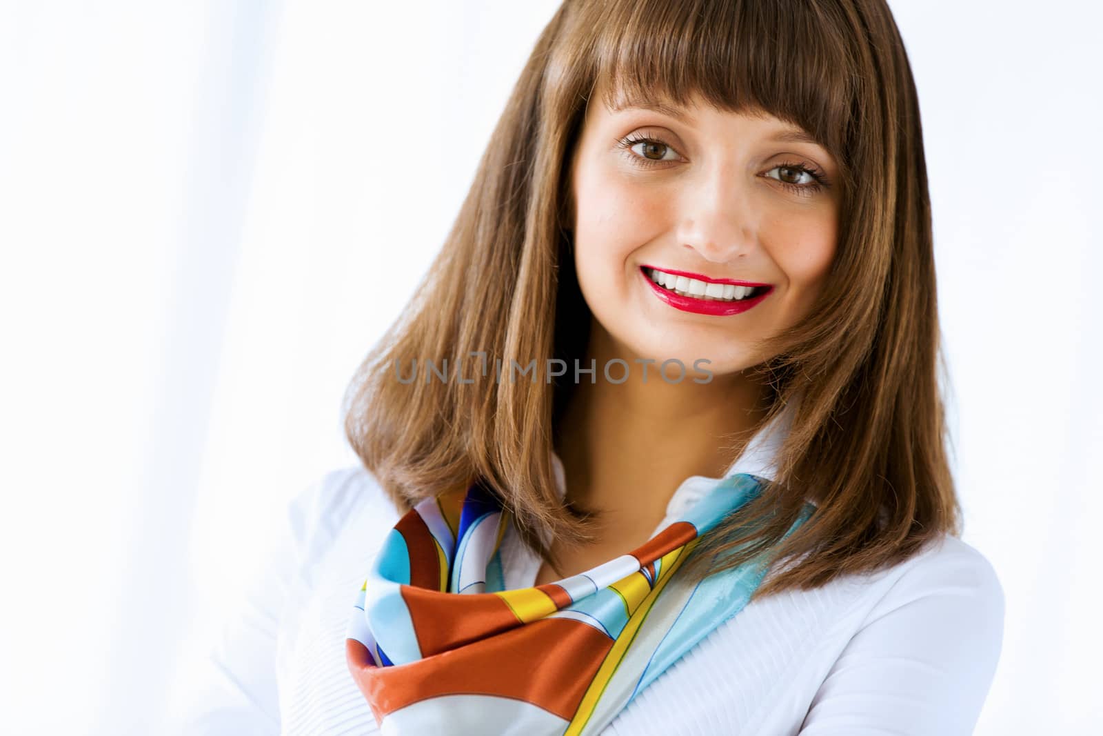 Image of attractive successful businesswoman in business suit smiling