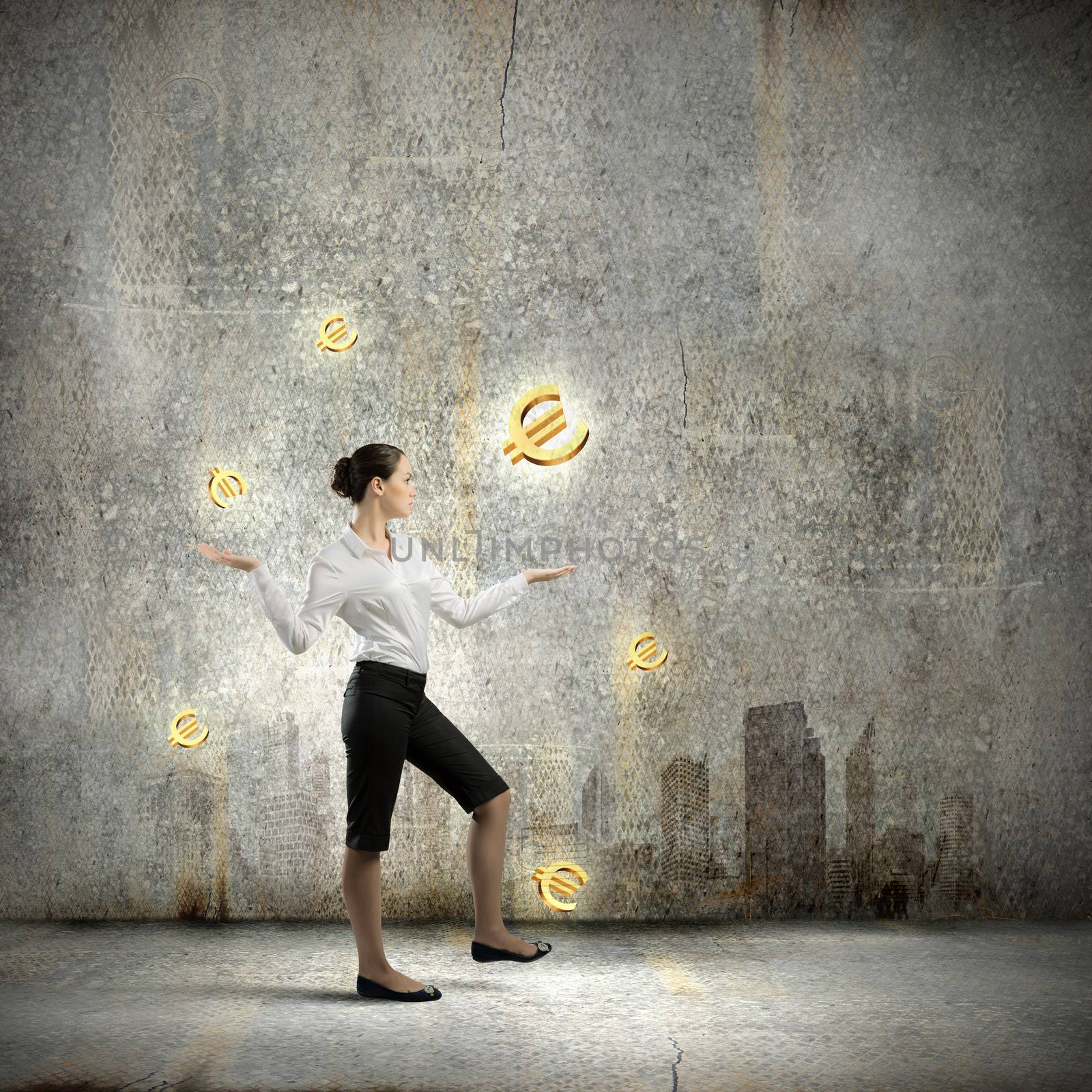 Image of businesswoman juggling with euro symbols. Currency concept
