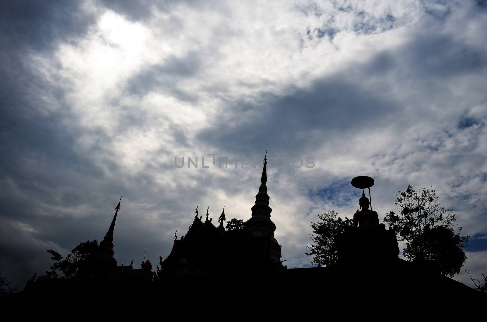 The Pagoda and Buddha Image in Silhouette.