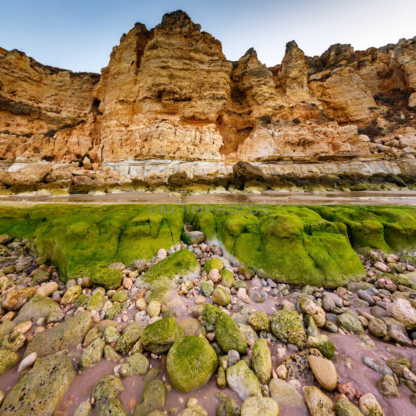 Rocks and Cliffs of Porto de Mos Beach in the Morning, Lagos, Algarve, Portugal