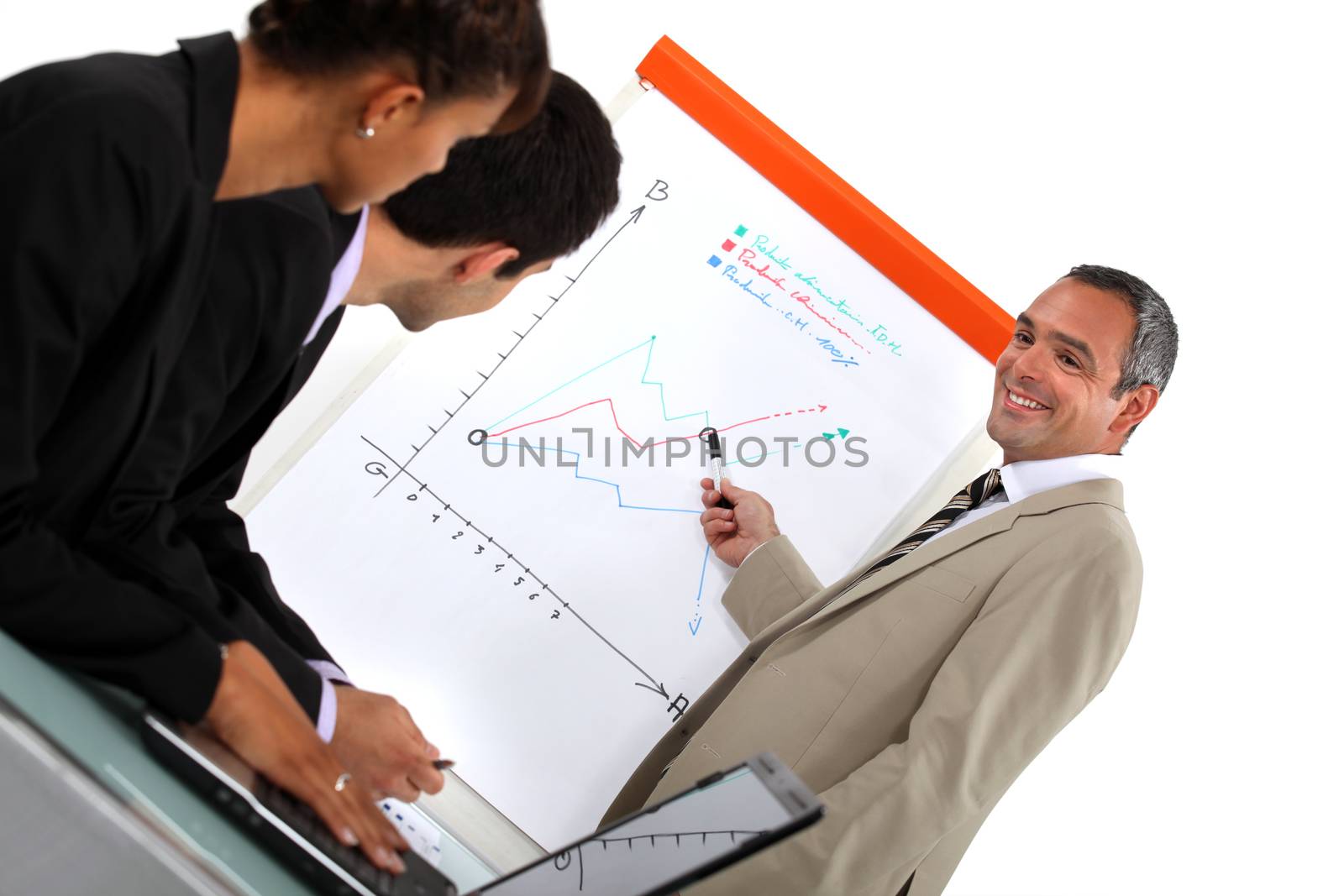 Businessman with a flipchart by phovoir