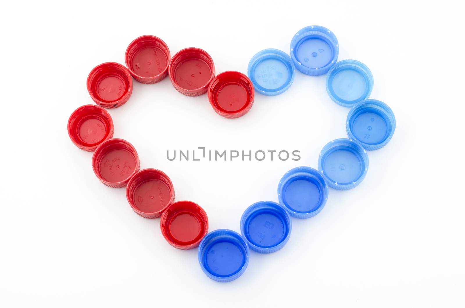 red blue heart bottle cap isolated on white background