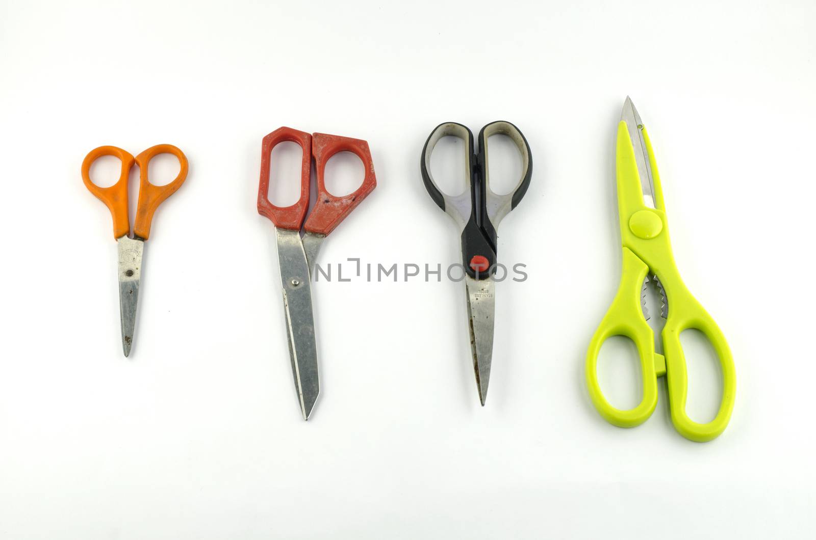 four used Scissors isolated with white background