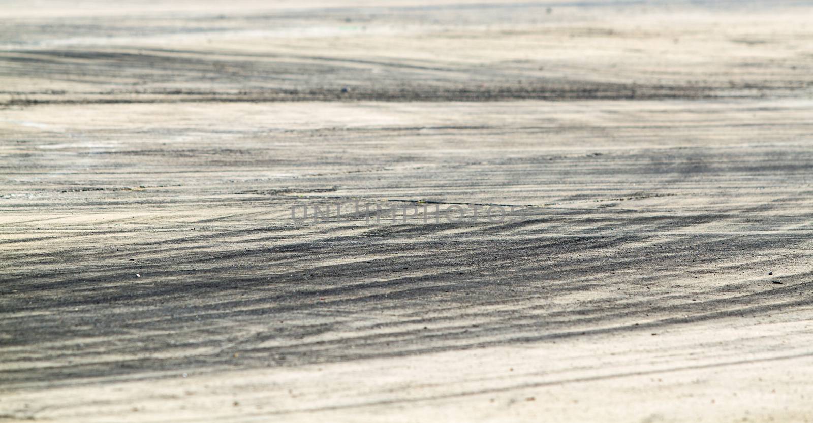 Background with tire marks on road track