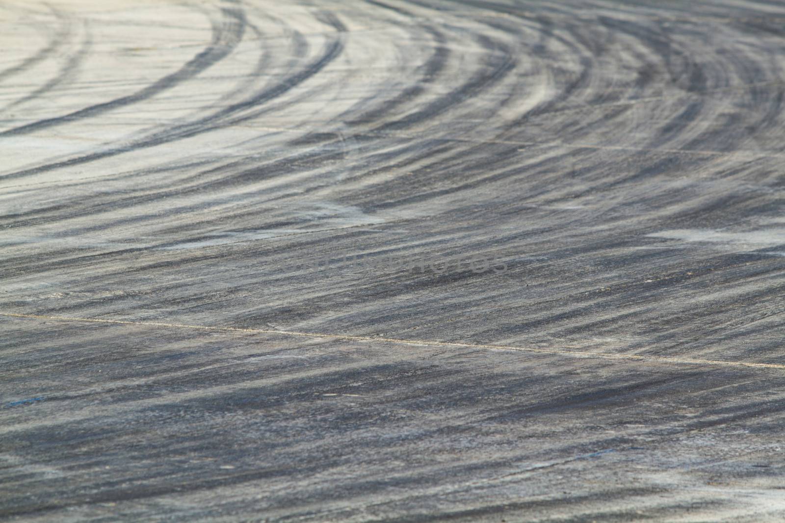 Background with tire marks on road track
