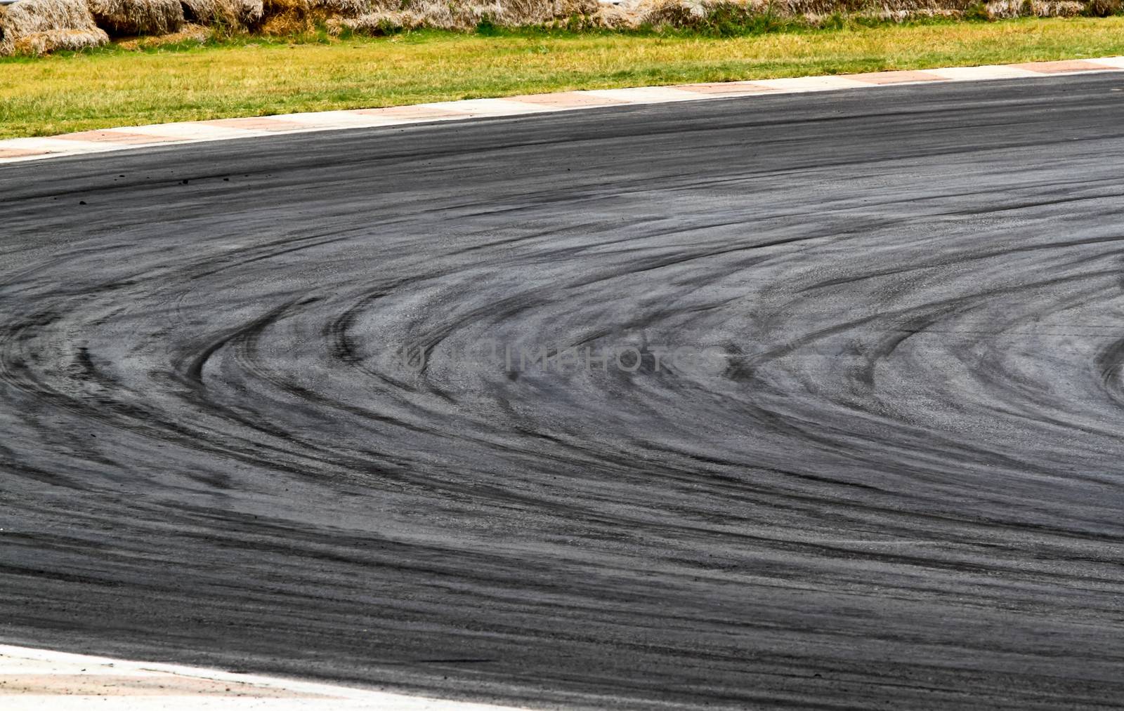 Background with tire marks on road track