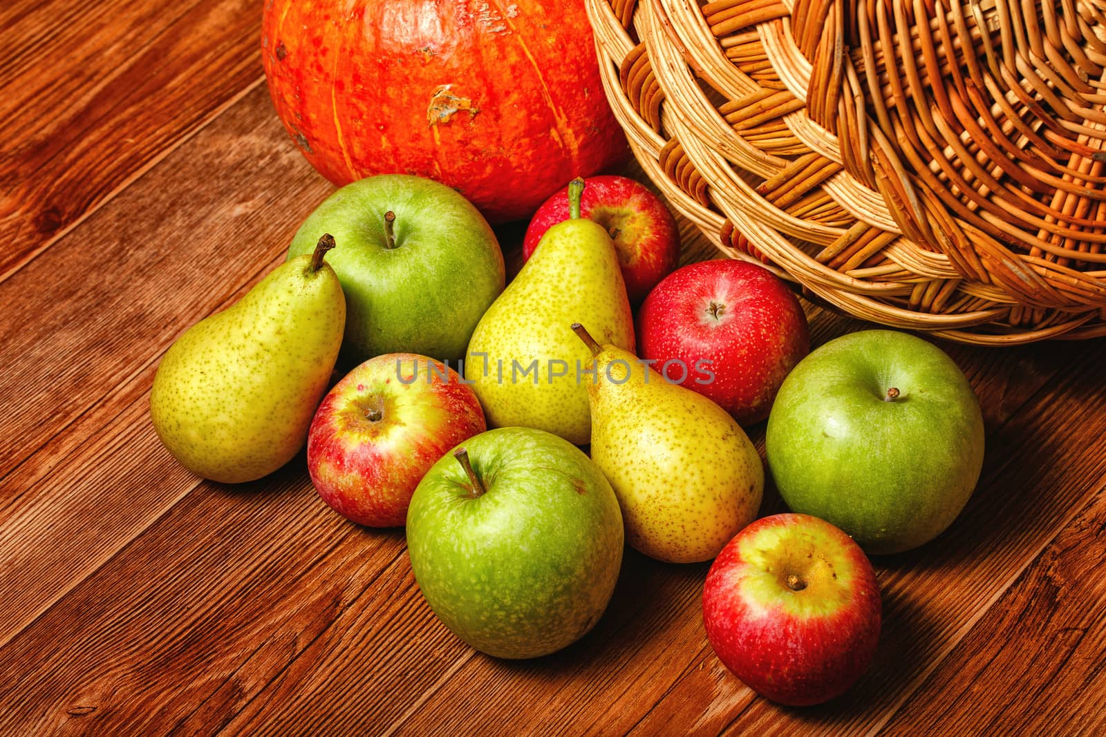 Harvest of ripe fruits and vegetables: apples, pears and pumpkin