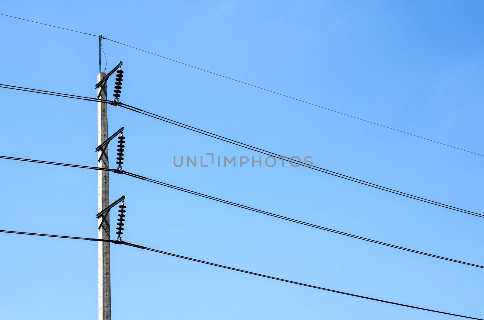 Electricity post on blue sky