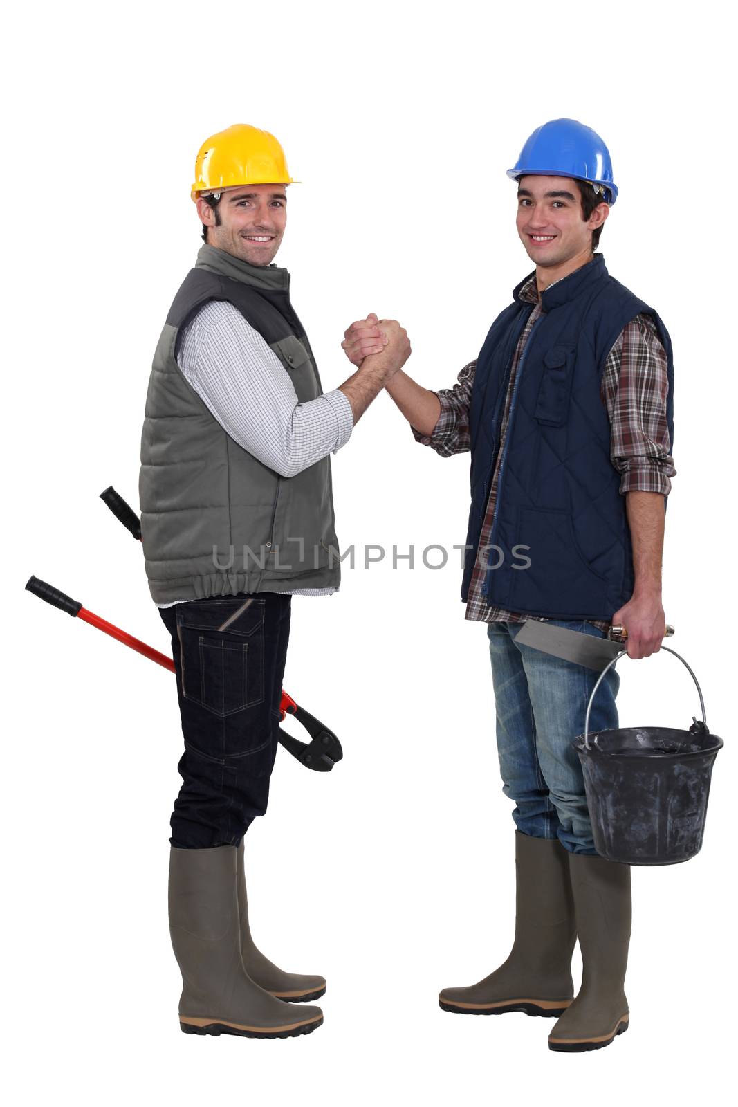 Construction workers greeting each other
