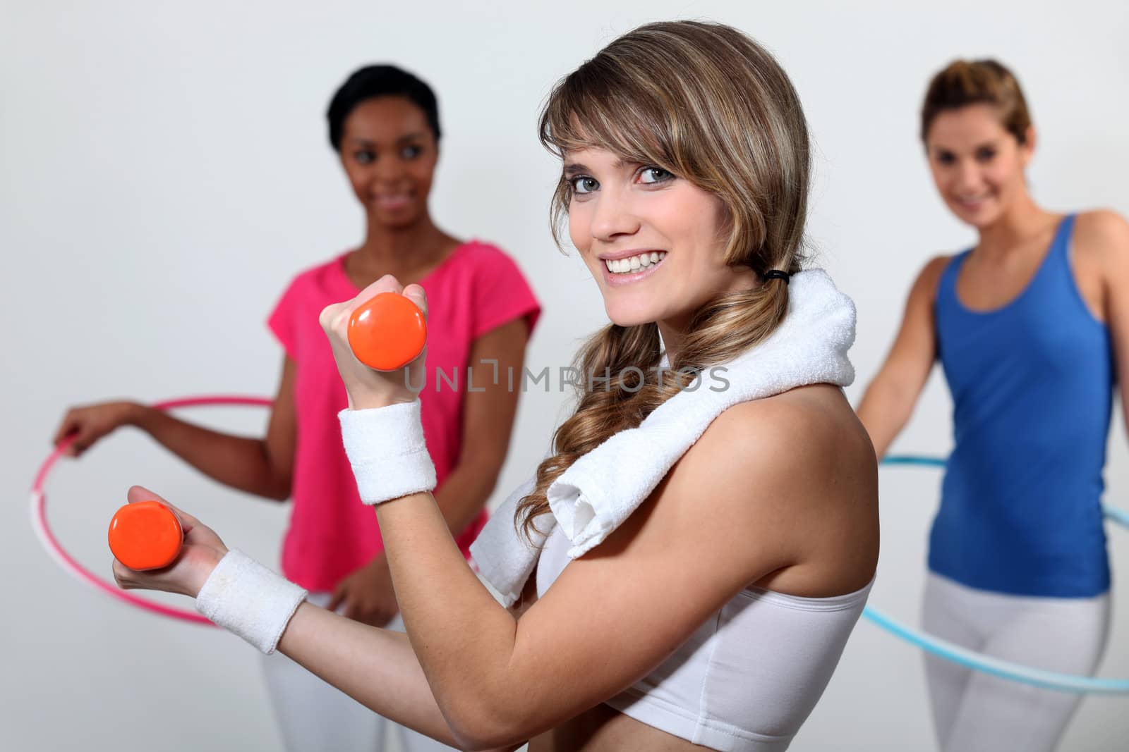 Women at the gym by phovoir