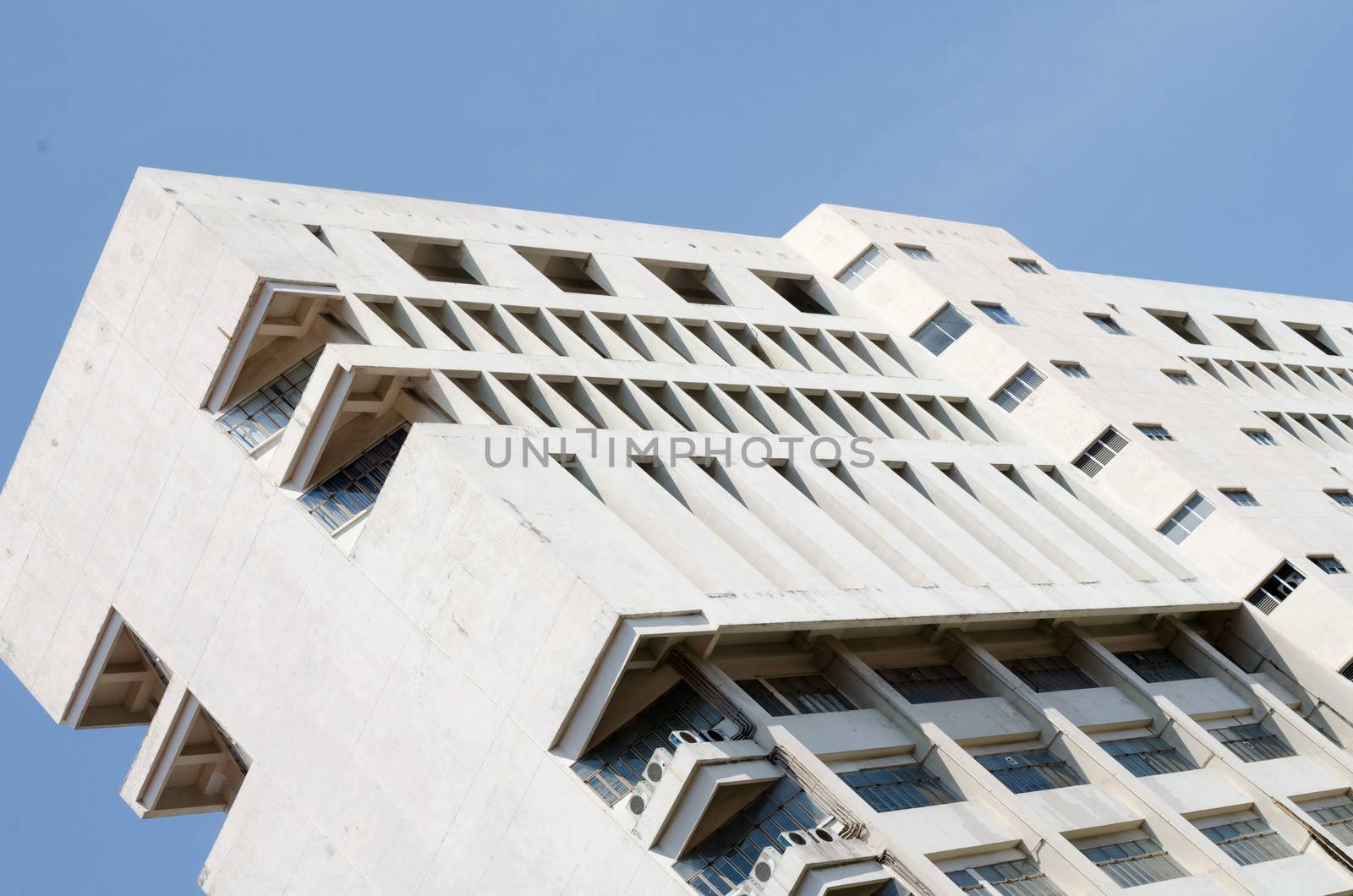 white building texture and blue sky