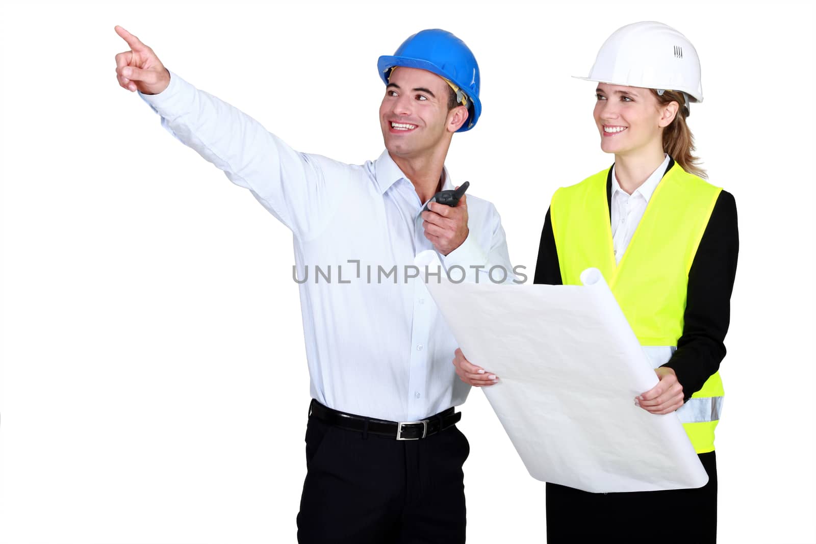 female architect all smiles accompanied by foreman by phovoir