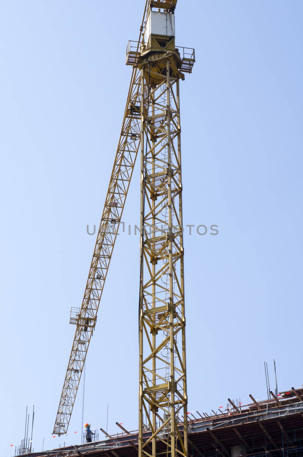 crane on blue sky background by ammza12