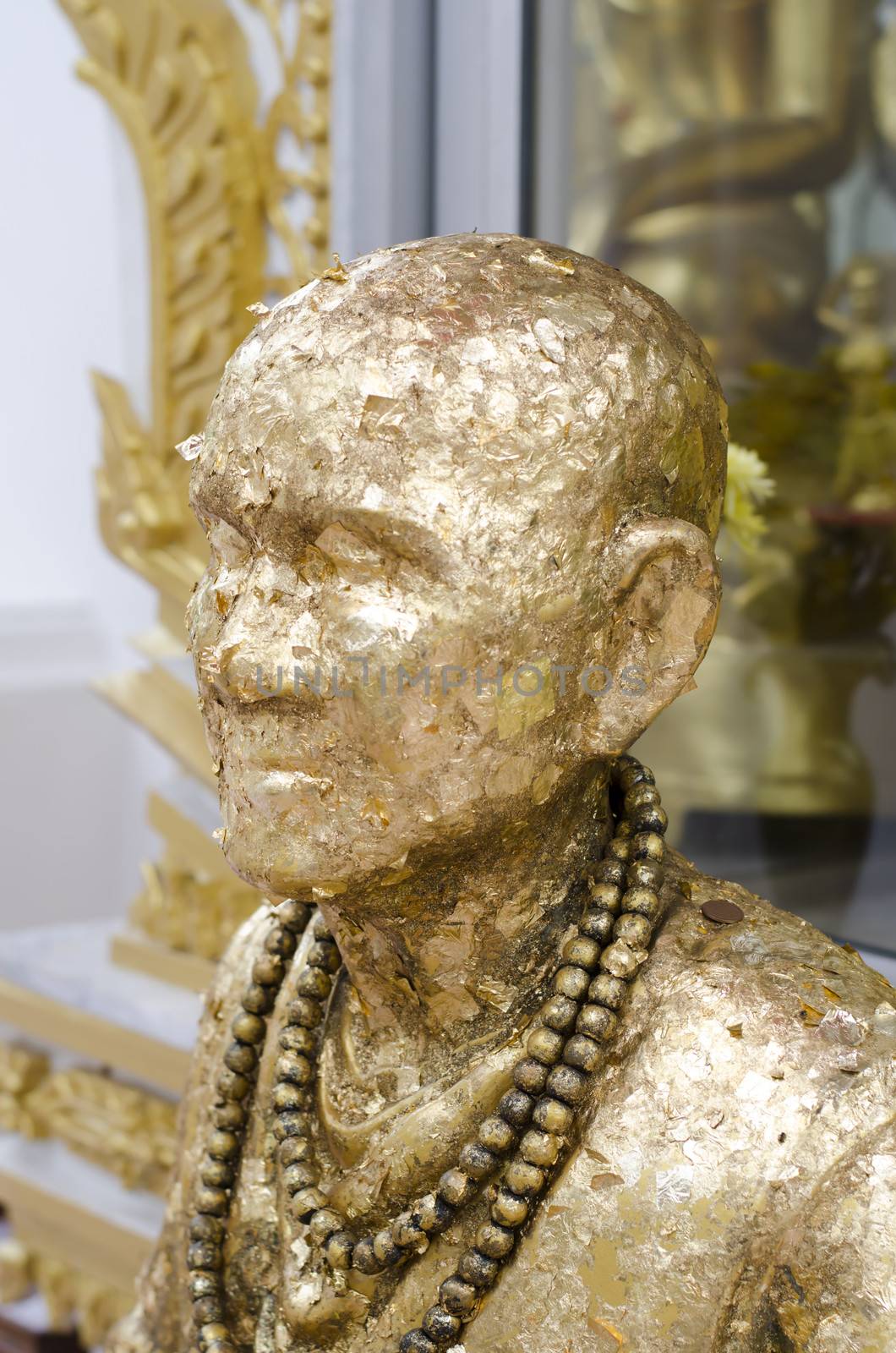 gold Buddha statue in Thailand temple