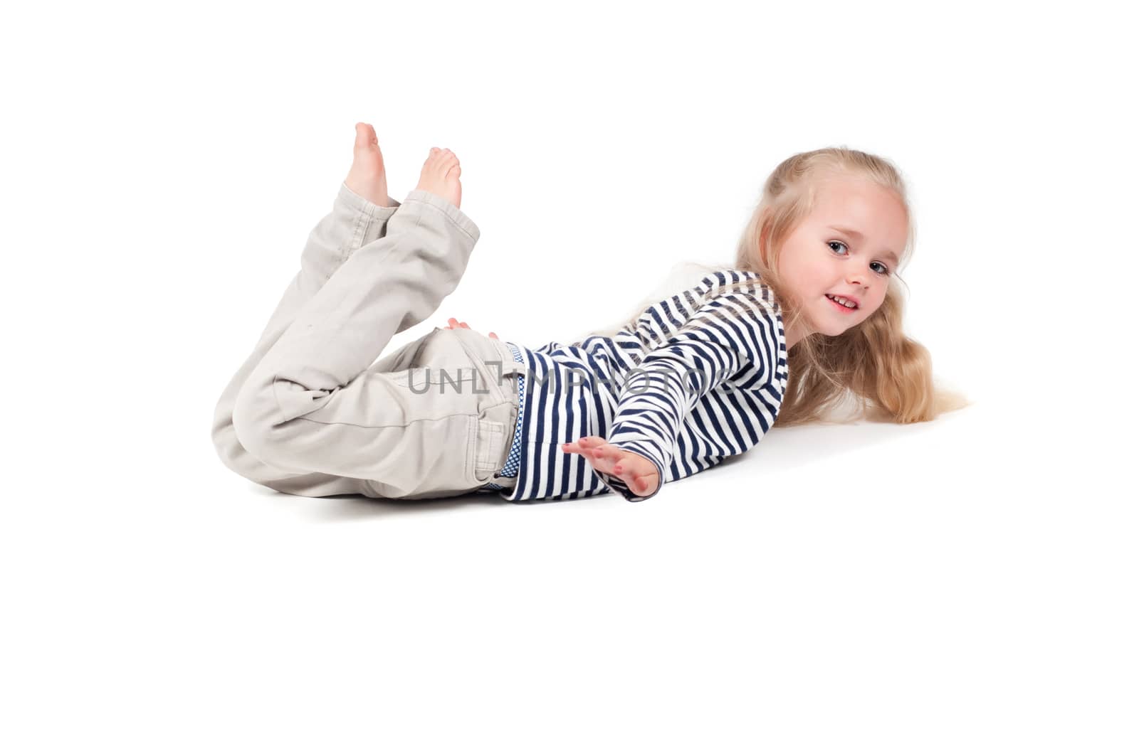 Shot of little cute girl with long hair in studio