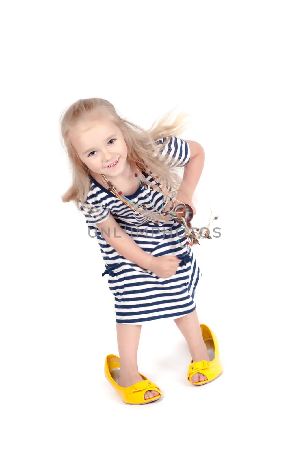 Shot of little cute with mother shoes in studio