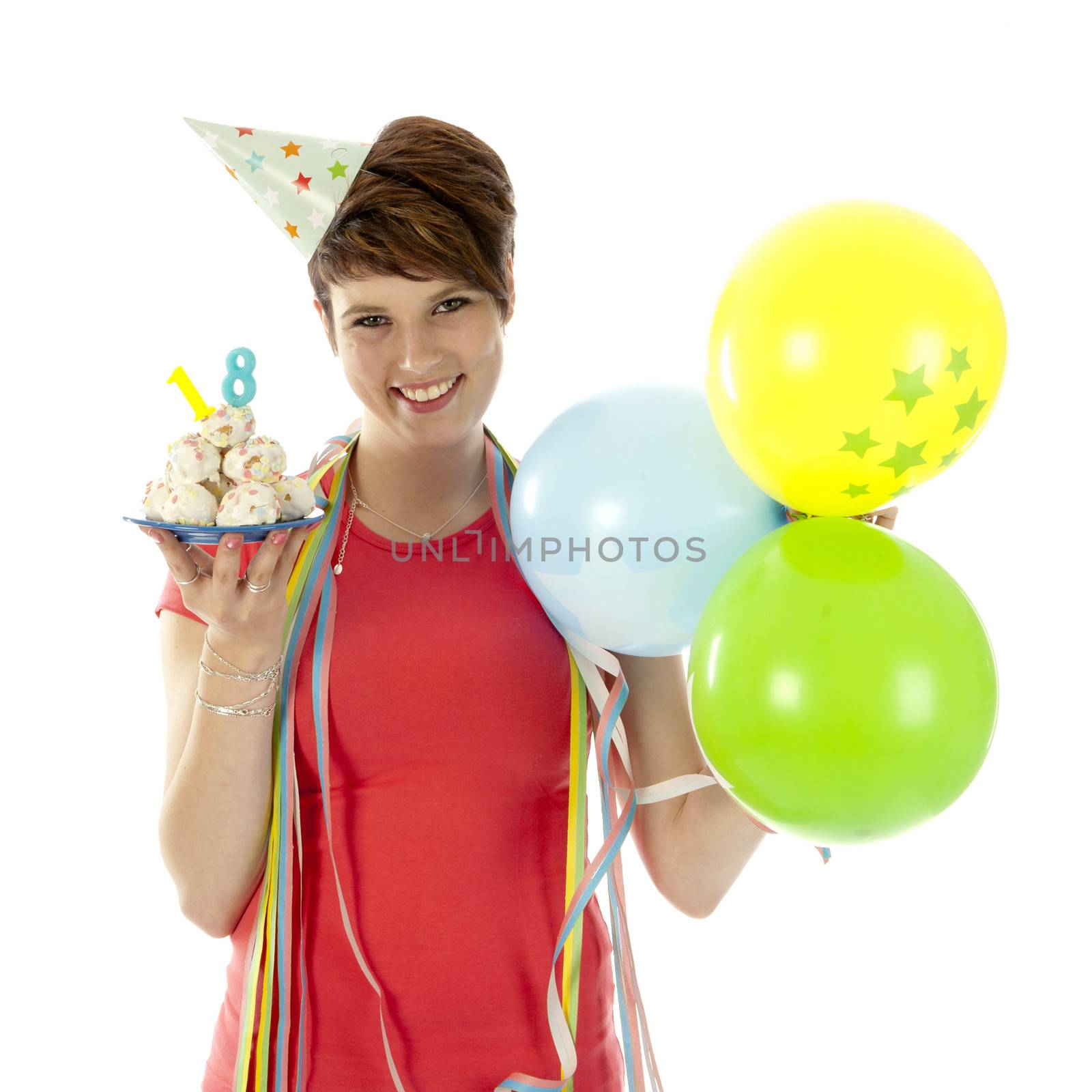 a birthday girl on her 18th birthday, holding a cake with a candle on a white background