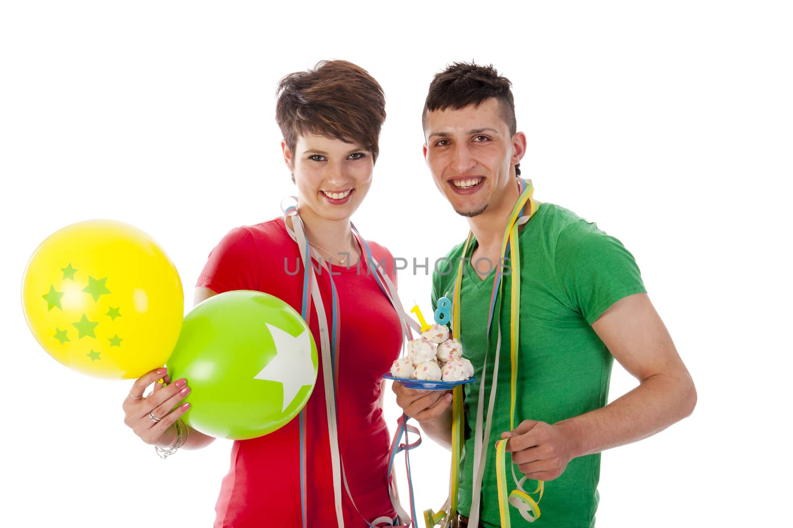 a boy and a girl with balloons and a birthdaycake