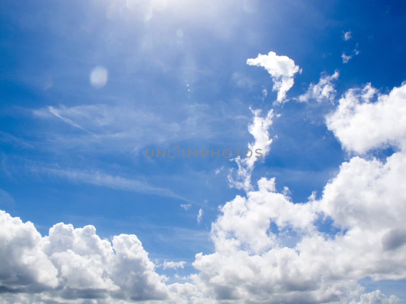Beautiful fluffy clouds at a blue sky
