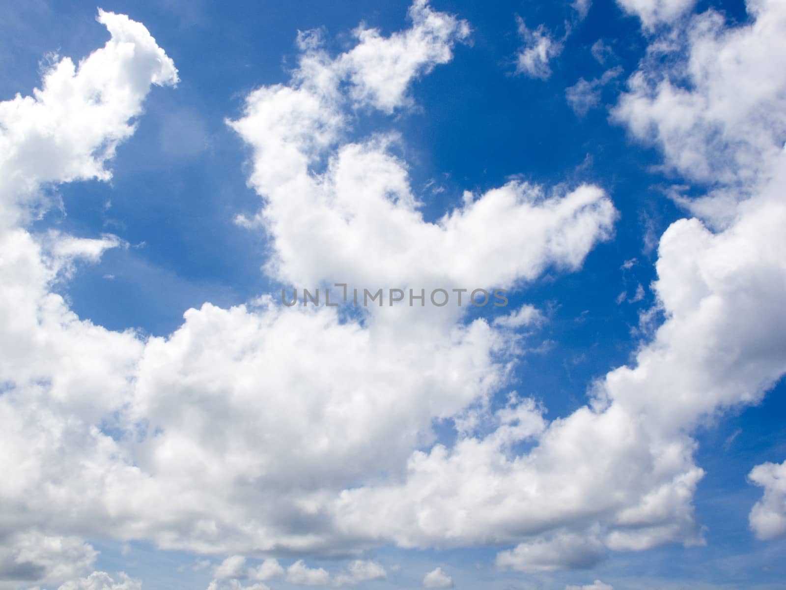 Beautiful white clouds at a blue sky