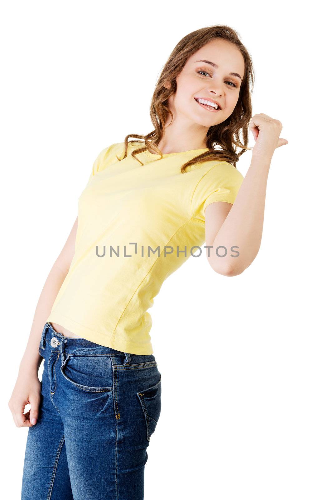 Happy , excited young woman pointing on copy space by BDS