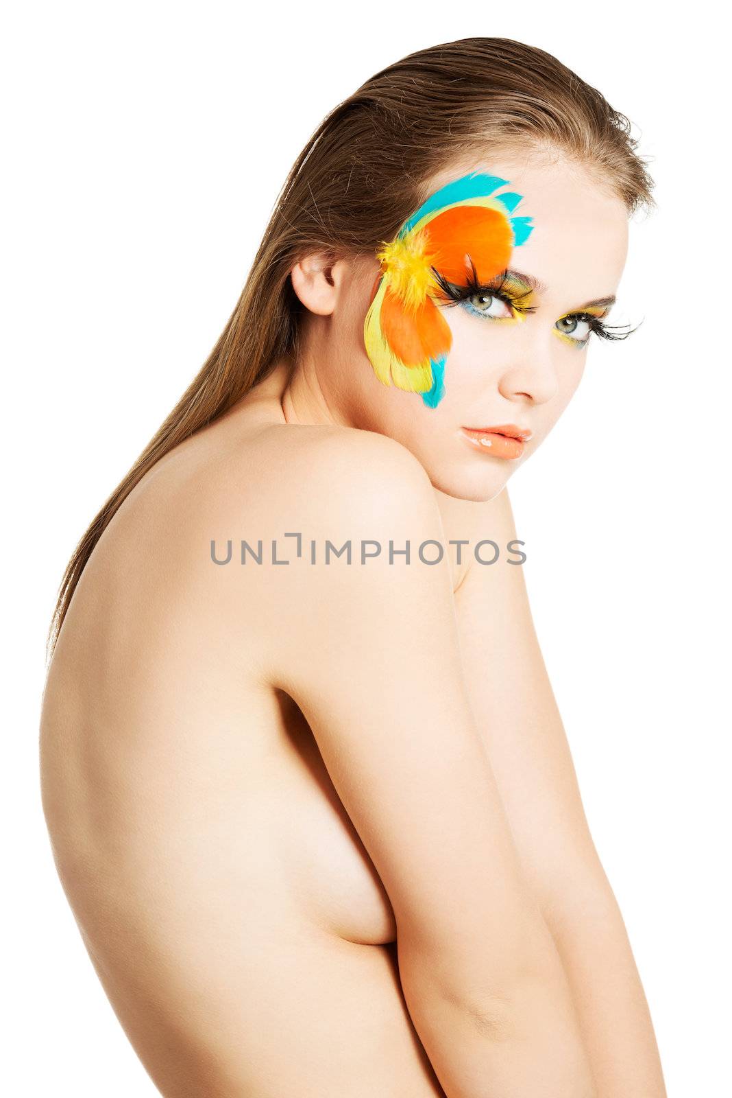 Beautiful woman with abstract artistic make up.
