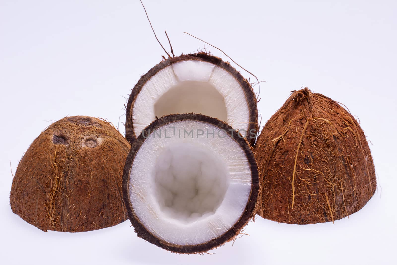 cut coconut isolated on white background