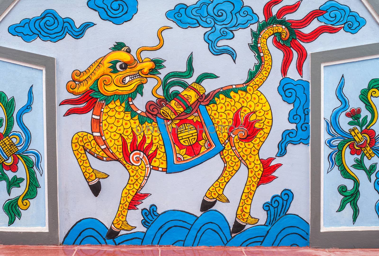 Vietnam Quang Binh Province: Chinese dragon painting at cemetery. by Claudine