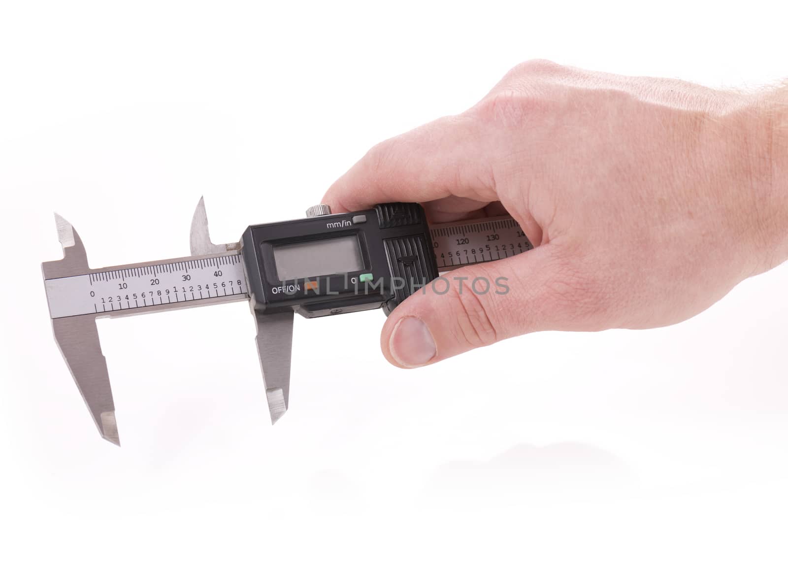 Hand holding vernier for measurment on white background