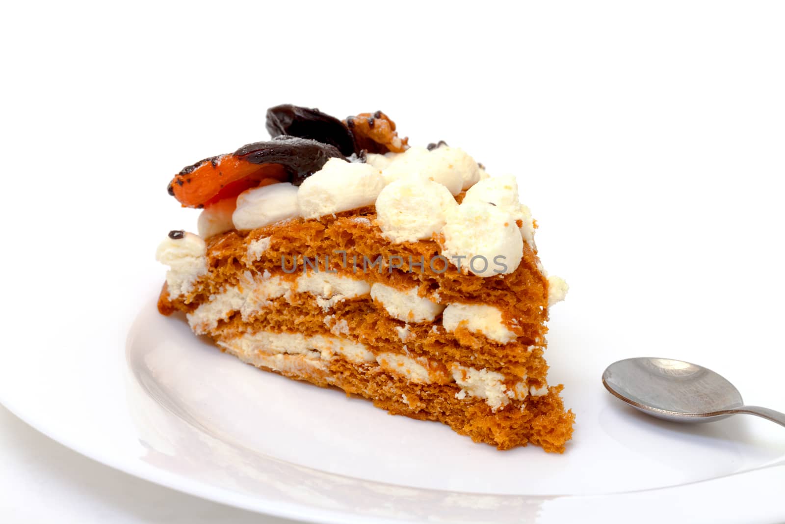 Piece of sweet cake on plate, closeup, white background