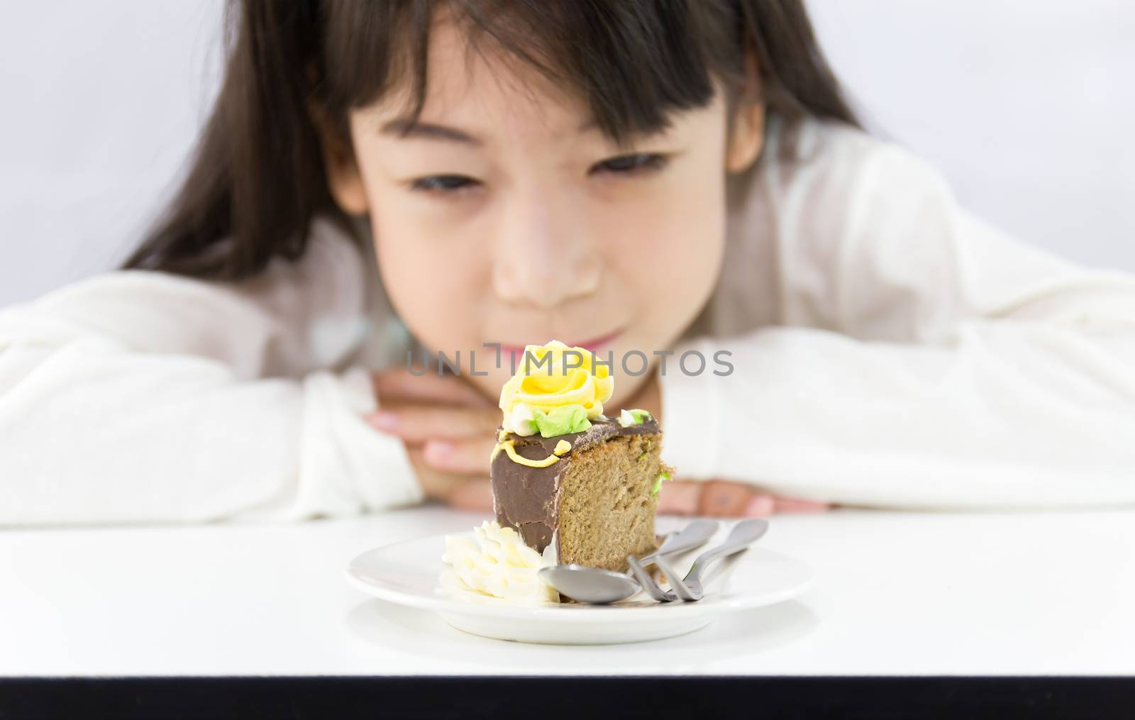  The girl stared at the cake by stoonn