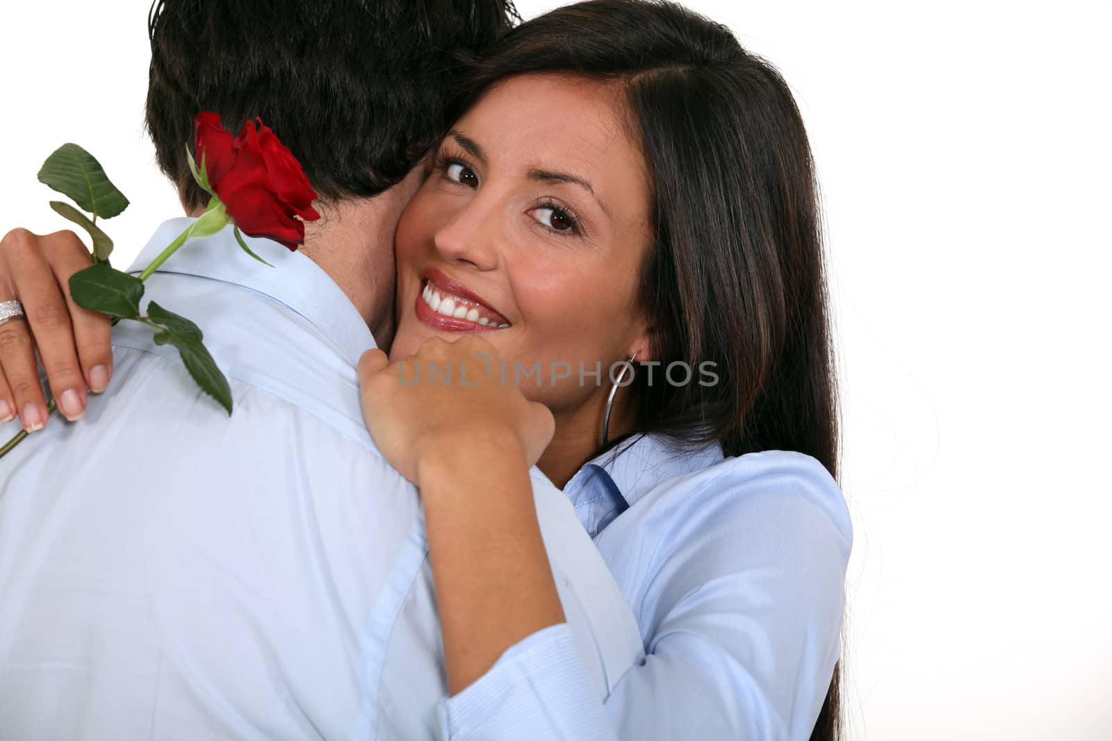 couple with rose in hand