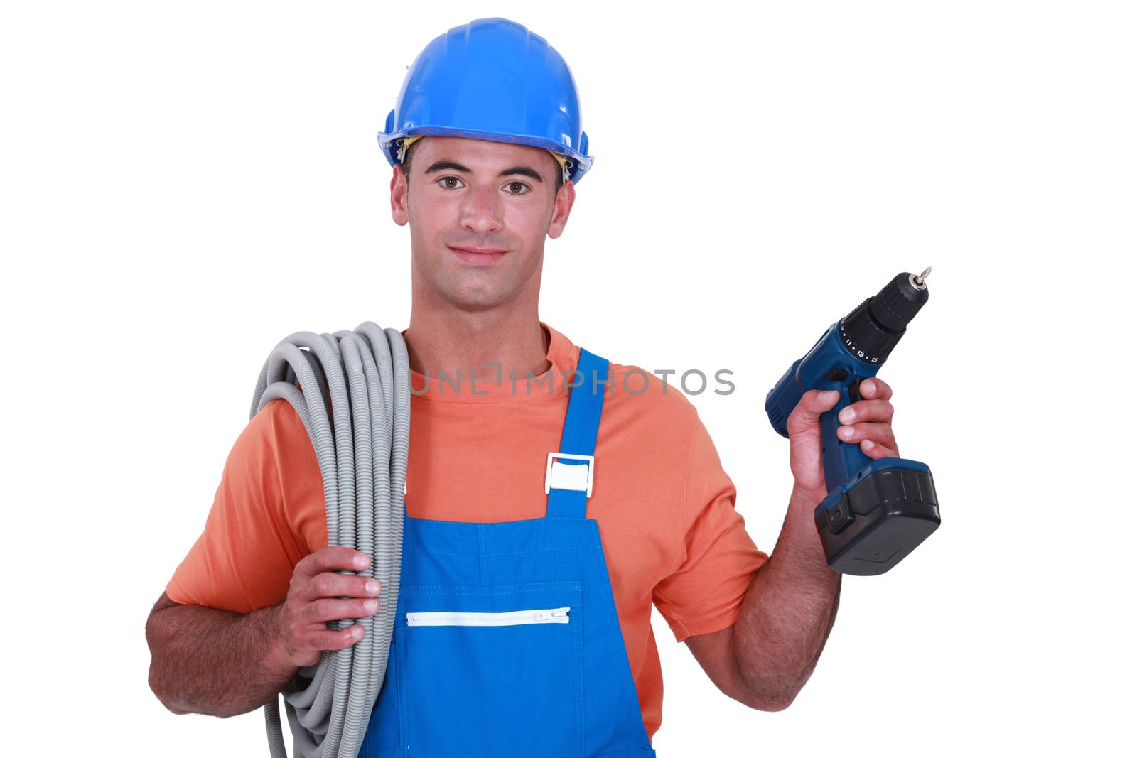 Electrician with wiring and cordless drill