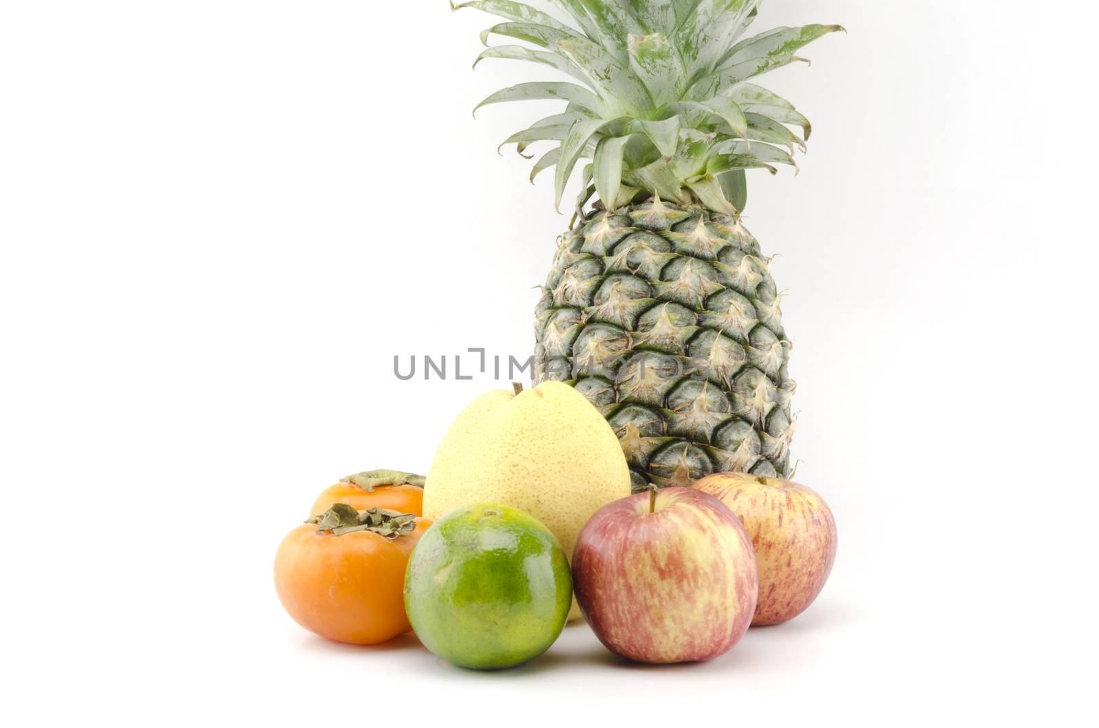pineapple chinese pear persimon and green orange isolatedon white background