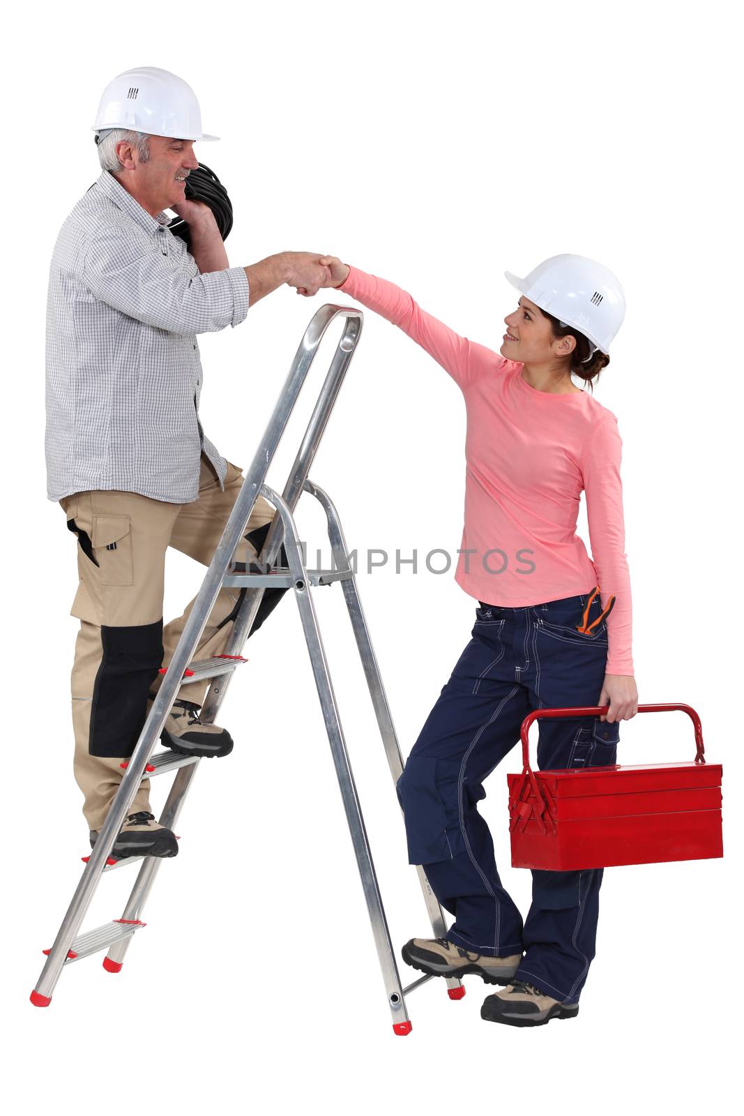 Experienced tradesman meeting his new apprentice for the first time