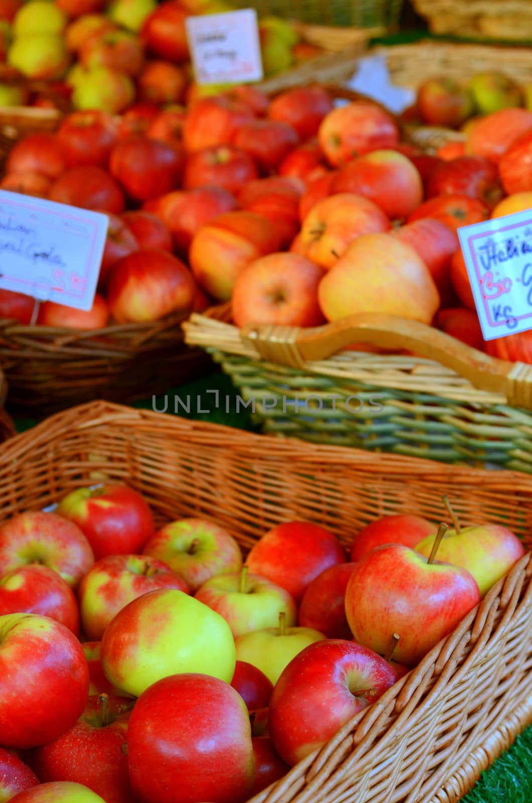 Food And Retail Image Of Baskets Of Apples In A Marketplace