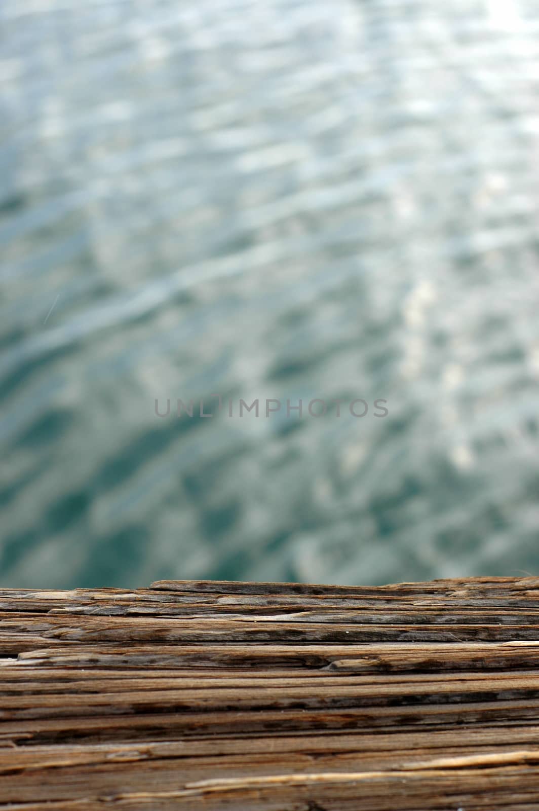 Weathered Wood in a Harbour with Copy Space