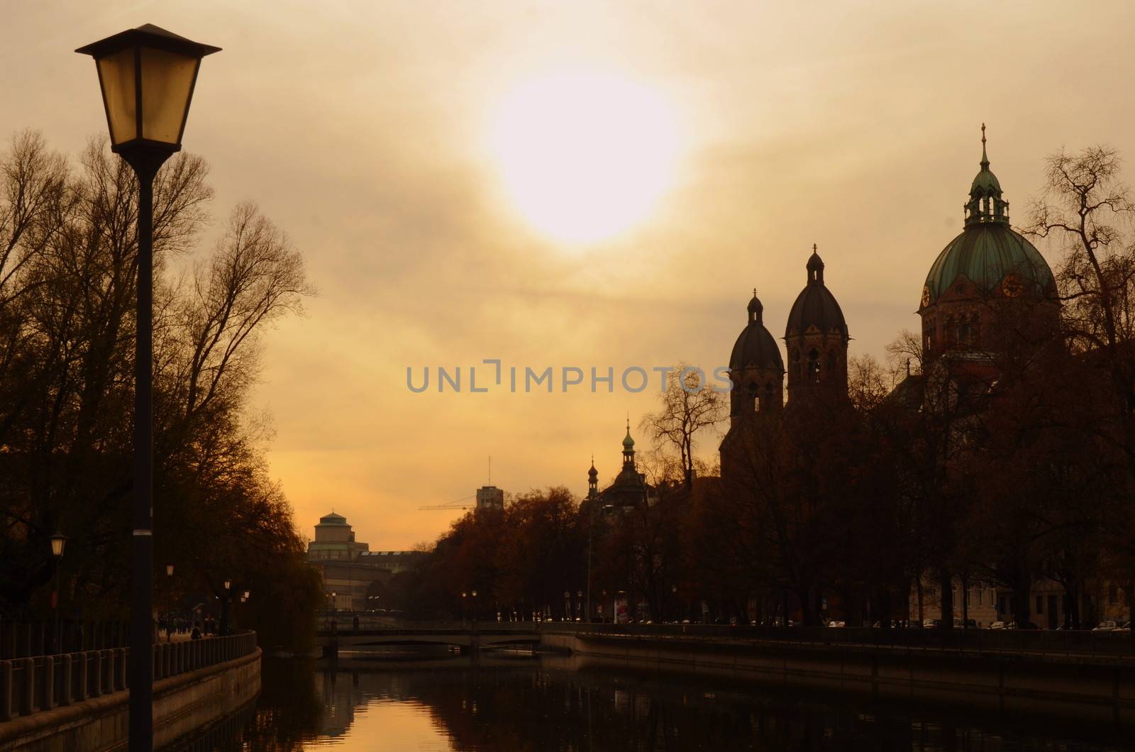 A Silhouette Of The Munich, Germany Skyline At Sunset
