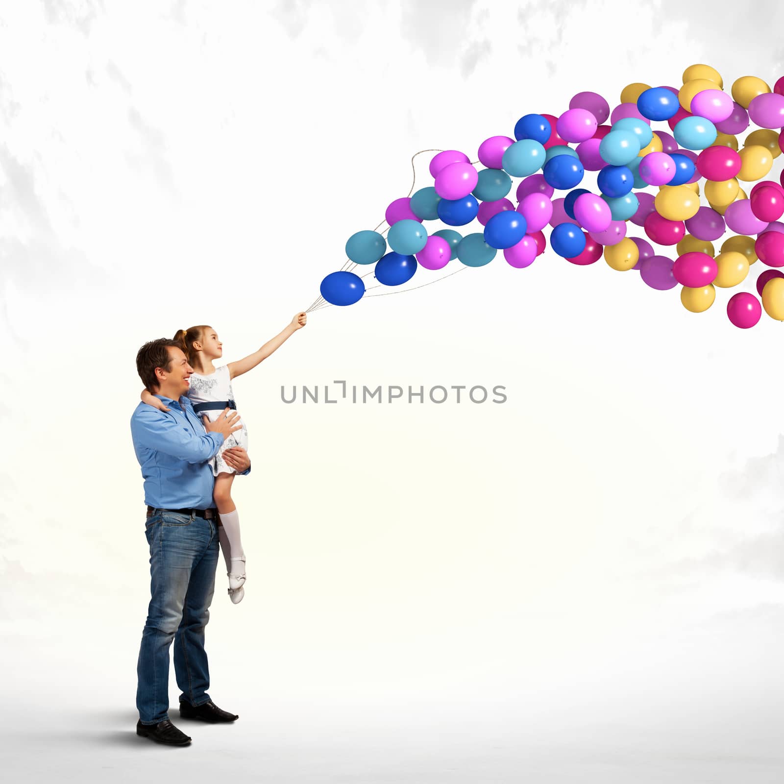 Image of happy father holding on hands daughter and balloons