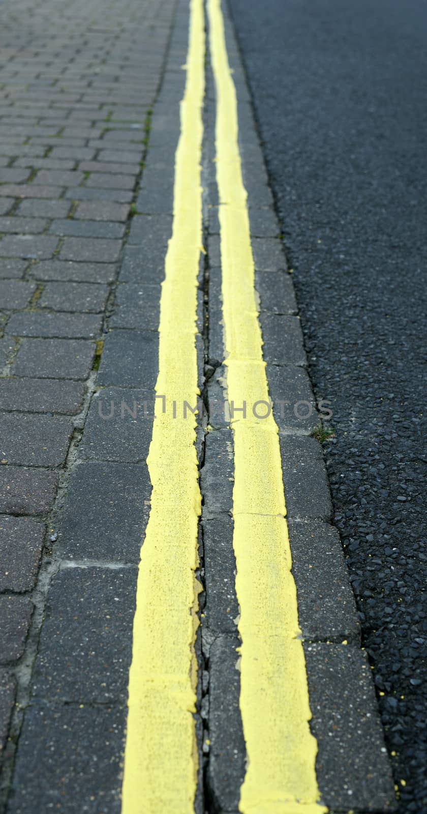 double yellow line dissapering into the distance